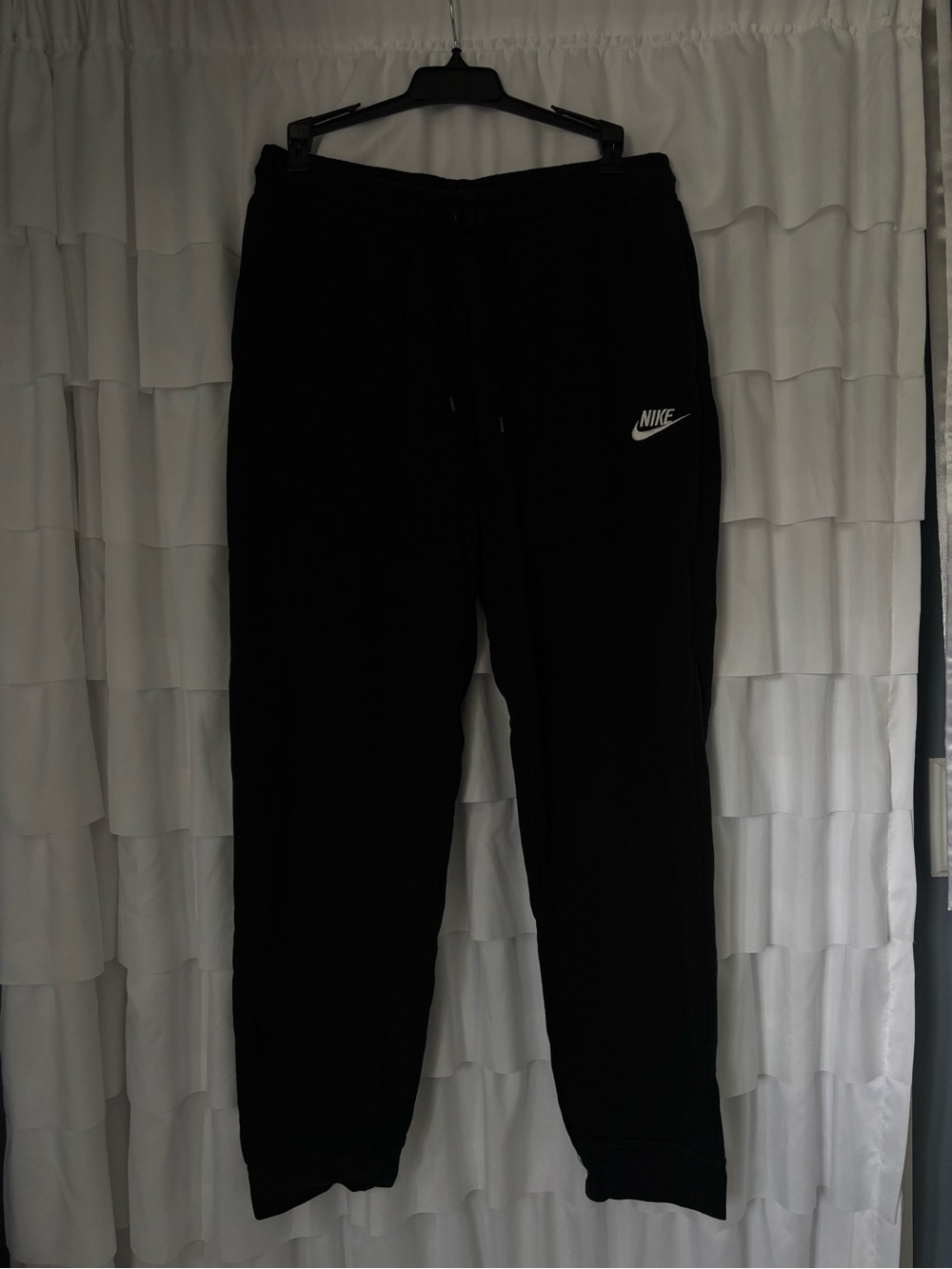 Nike Black Joggers with White Swoosh Detail